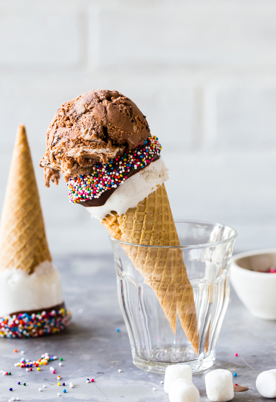 chocolate ice cream on sprinkle cone