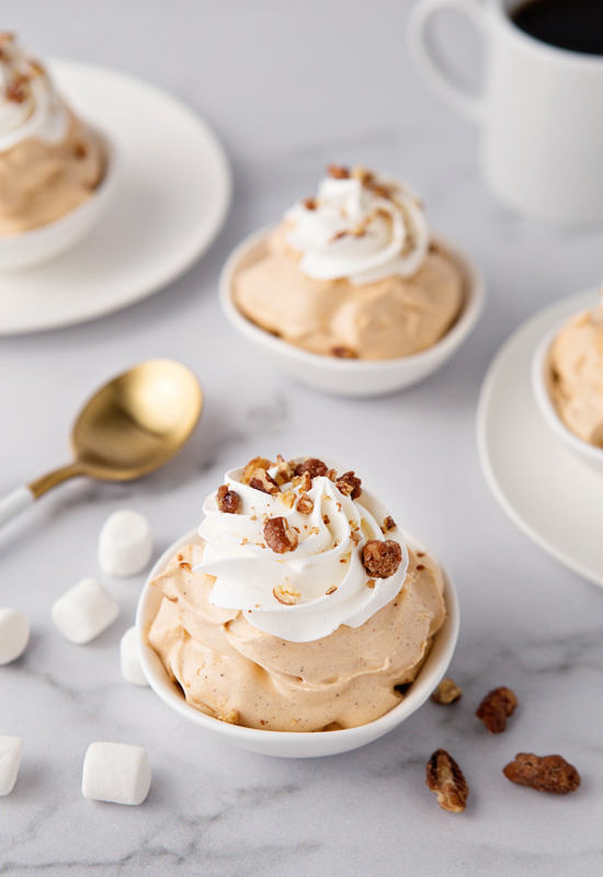Pumpkin Spice Fluff with marshmallows, pecans, coffee and gold spoons